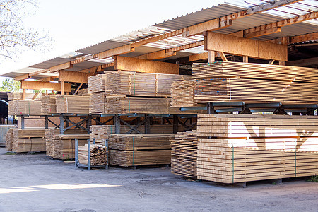 存放在仓库中的木制面板镶板工业补给品资源贮存木工床单销售量零售木材图片