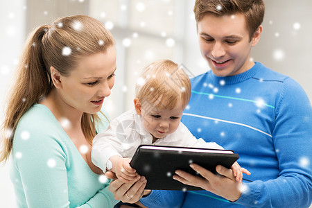 父母和可爱的婴儿与平板电脑Pc育儿游戏童年母性技术女儿女孩身份男生微笑图片