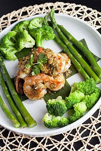 带蔬菜的虾类运动黄油胡椒小龙虾宏观烹饪海鲜碳水美食餐厅香菜图片