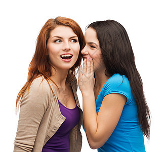 两个笑着笑着的女孩 悄悄地说八卦女性闺蜜友谊传闻青年废话学生棕榈青少年惊喜图片