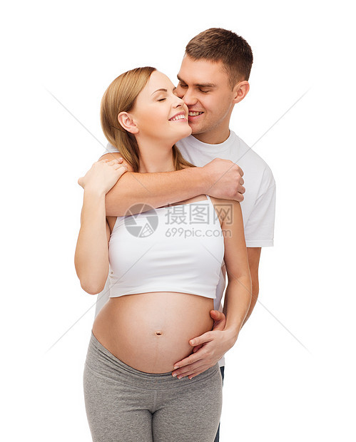 幸福的年轻家庭预产期子女身体婴儿丈夫男生产妇妻子父母父亲微笑腹部图片