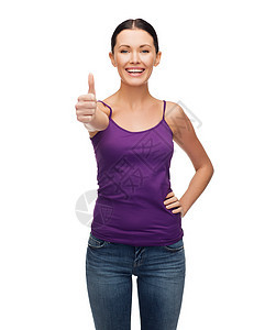 穿过手的空紫色罐头学生打印背心牛仔裤展示女孩快乐广告青少年女性图片