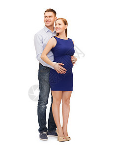 幸福的年轻家庭等待着孩子成长产妇父母微笑生活丈夫男生拥抱裙子父亲婴儿图片