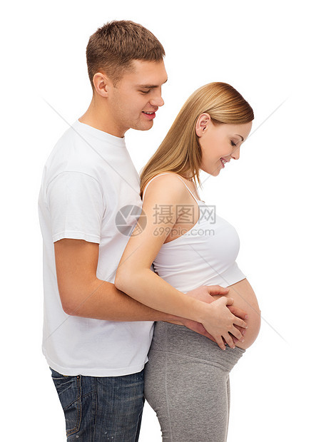 幸福的年轻家庭预产期子女婴儿女士母亲身体男人母性孩子拥抱丈夫女孩图片