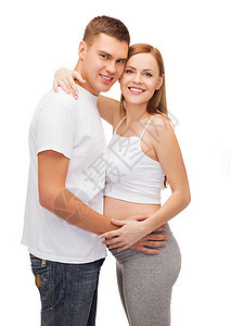 幸福的年轻家庭预产期子女丈夫肚子微笑身体女士妻子男性女性女孩父母图片