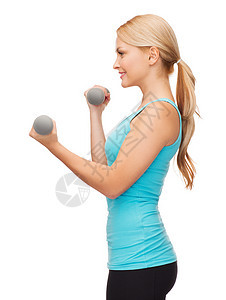 年轻运动女青年 有轻聋哑铃肌肉数字身体耐力运动装运动员力量健身房健康重量图片