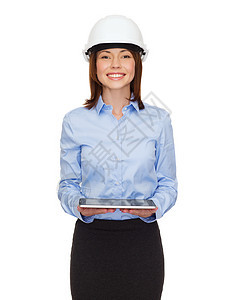 戴白头盔 佩有平板电脑的年轻女商务人士开发商建筑师雇主成人互联网人士商业企业家工程师承包商图片