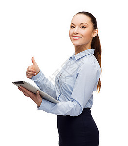 看着平板电脑的微笑着的女人互联网屏幕人士手势技术展示办公室商业上网快乐图片