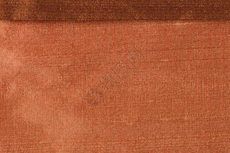 橘橙布衣服织物白色帆布纤维材料编织橙子棕色纺织品背景图片