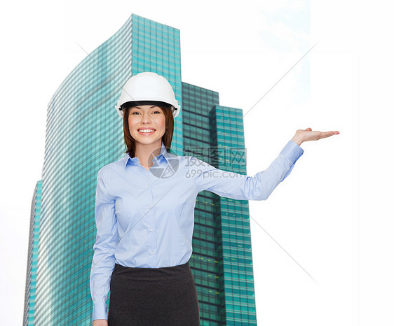戴头盔的女商务人士握着手掌开发商微笑中心承包商管理人员成人经理老板建筑学女性图片