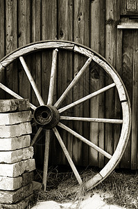 旧车轮木头棕褐色古董砖块图片
