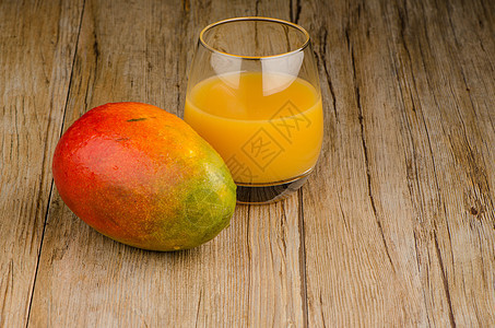 新鲜芒果汁异国果味热带液体果汁橙子水壶奶油状甜点黄色图片