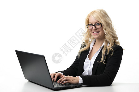 在笔记本电脑上工作的妇女学习成人互联网秘书女孩女性商务管理人员商业桌子图片
