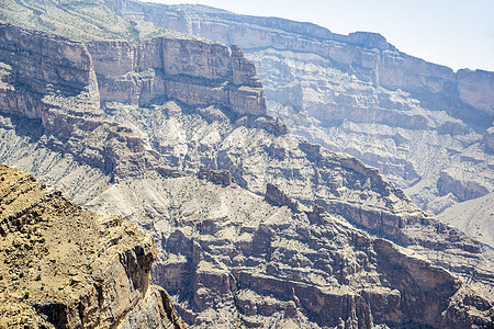 峡谷荒野旱谷天空踪迹冒险丘陵旅行探索地质学沙漠图片