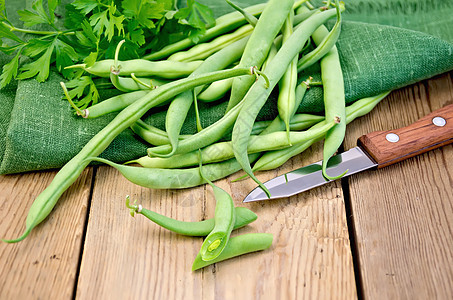 用刀子在板上放绿豆水果水平蔬菜绿色食物植物餐巾豆类营养农业图片