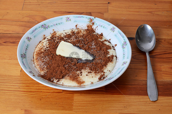 稀饭早餐盘子午餐食物黄油木头桌子营养可可牛奶图片