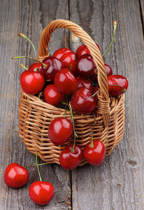 甜樱桃健康饮食灰色宝石色红色水果背景饮食柳条乡村甜食图片