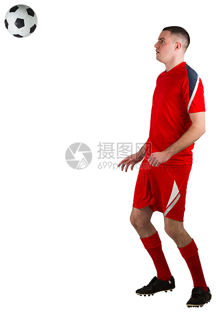 健身足球运动员与球赛播放器运动服男性活动白色齿轮运动红色男人图片