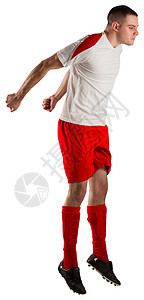 健身足球运动员跳起来活动播放器运动服跳跃男人齿轮白色运动红色男性图片
