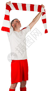 持条条围巾的足球运动员播放器优胜者红色齿轮活动男人运动男性欢呼欣快感图片