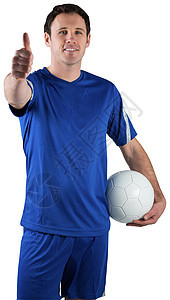 英俊的足球运动员握着球男性播放器运动服运动蓝色齿轮活动男人图片
