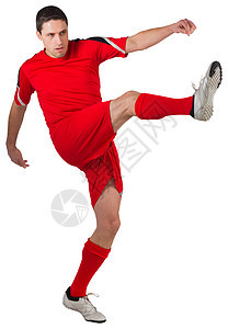 年轻足球运动员踢球齿轮运动服播放器男人运动男性活动红色图片