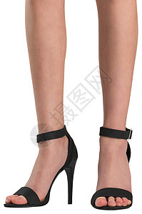 黑凉鞋中的女性脚高跟鞋凉鞋带子黑色脚趾图片