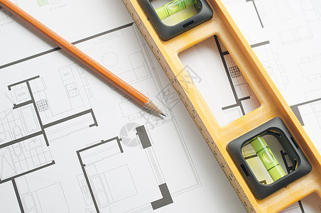 并用一个建筑师计划建造绘画房子工程蓝图铅笔装修构造商业草图图片
