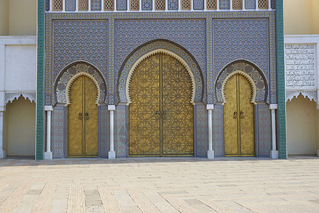 进入皇宫门廊金子城市国王游客蓝色马赛克黄铜入口文化图片