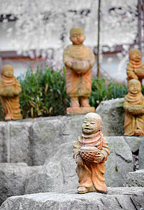 寺庙中的佛像宗教团体植物信仰岩石艺术沉思上帝佛教徒智慧图片