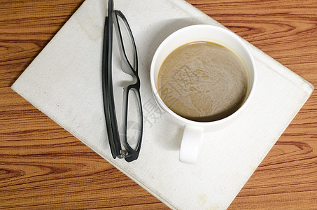 咖啡杯和带眼镜的笔记本日记组织咖啡教育金融文档职场饮料高架桌子图片