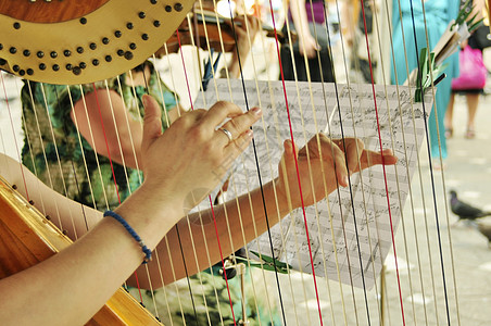竖琴播放器乐队女士音乐手指玩家歌曲音乐家字符串图片