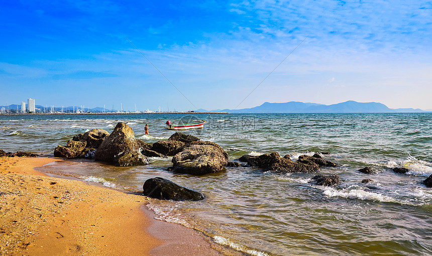 海滩旅游目的地运输晴天阳光渔夫天空旅行乌贼场景图片