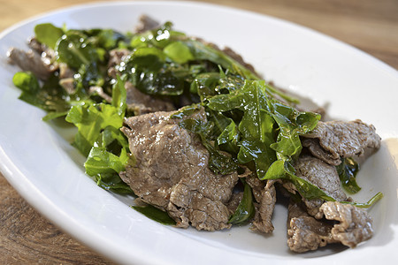 带火箭的牛肉条饮食烹饪衣服厨房草本植物牛肉红色蔬菜烧烤食物图片