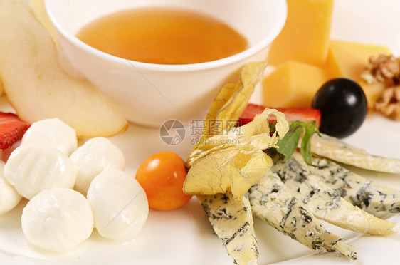 配蜂蜜的各类奶酪拼盘食物早餐坚果甜点蜂蜜蓝色熟食羊乳美食图片