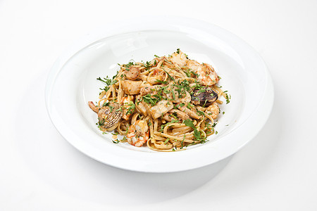 配海鲜的意大利面粉面条晚餐食物饮食美食文化辣椒香菜摄影盘子图片