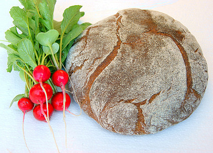 面包和蔬菜萝卜背景图片