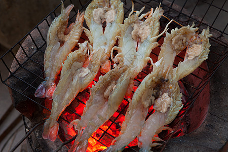 烧烤虾美食小龙虾对虾火焰烹饪橙子炙烤派对食物油炸图片