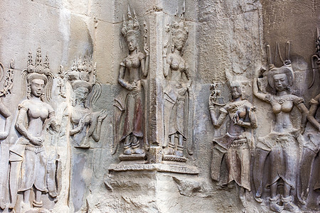 Apsara舞蹈家石雕刻 环绕在吴哥的墙壁上宗教女性遗产文明考古学雕像上帝高棉语收获寺庙图片
