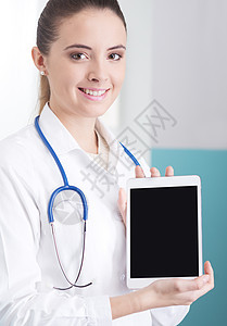 具有数字平板电脑的医生工作服技术医疗女性保健女士服务医护人员触摸屏医学图片