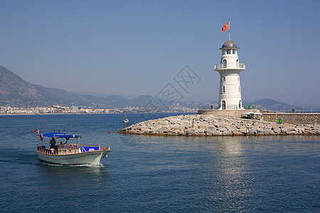 土耳其艾伦亚灯塔海岸线海景港口蓝色火鸡安全天空建筑学旅行海浪图片