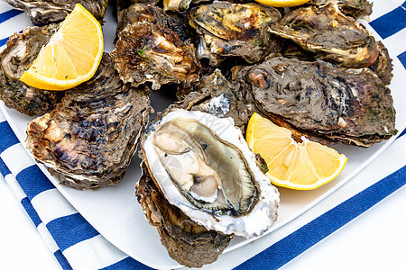 牡蛎午餐海洋壳类奢华营养贝壳柠檬熟食美食海鲜图片