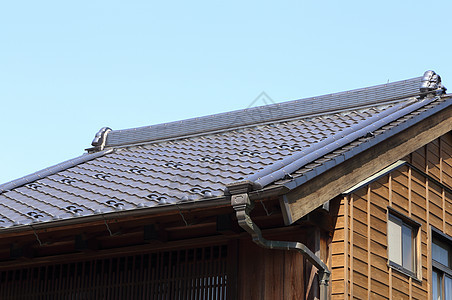 传统日本风格的顶楼建筑学宗教佛教徒历史建筑陶瓷历史性房子天空旅游图片