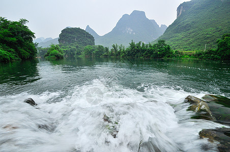 阳久桂林的李河山地貌编队荒野岩溶水路农村森林观光支撑天空村庄图片