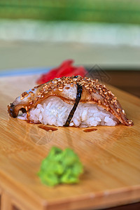 寿司单水果鳗鱼小吃蔬菜海鲜食物盘子午餐美食黑头图片