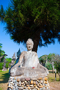 沉思者雕像老挝万象的佛祖公园 著名的旅游地标文化建筑寺庙受托人雕塑通勤者游客纪念碑风景沉思背景