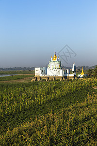 Ubein桥上的白色塔 世界最长的木桥寺庙旅行宝塔太阳日落场地蓝色房子木头生活图片