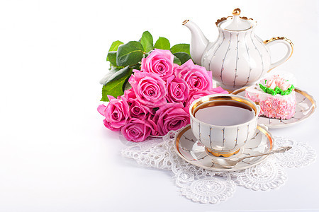 一杯茶和玫瑰小吃英语美食甜点糖果花束磨砂婚礼饮料水壶图片