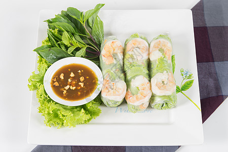 里面有虾的新鲜卷子盘子草本植物饮食黄瓜食物烹饪海鲜沙拉蔬菜海辛图片