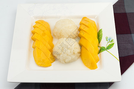 加鲜芒果的甜糊米面椰子牛奶食物美食热带文化甜点坚果午餐奶油水果叶子图片